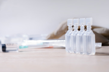 Injection of vaccines and syringes. It is used for the prevention, immunization and treatment of coronavirus infection, doctor uses syringe (new coronavirus disease 2019, COVID-19, Wuhan nCoV 2019). 