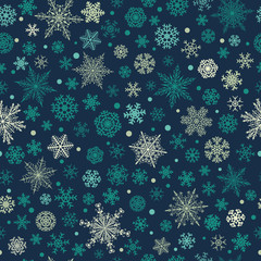 Christmas seamless pattern of various complex big and small snowflakes, white on blue background