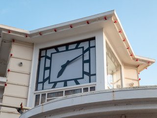 old style clock on a pier 