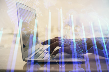 Double exposure of woman hands typing on computer and forex chart hologram drawing. Stock market invest concept.