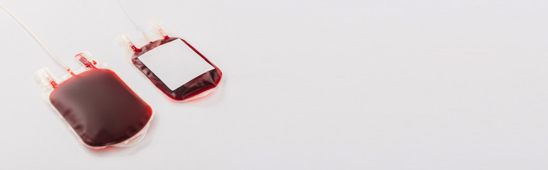 blood donation packages with blank label on white background, panoramic shot