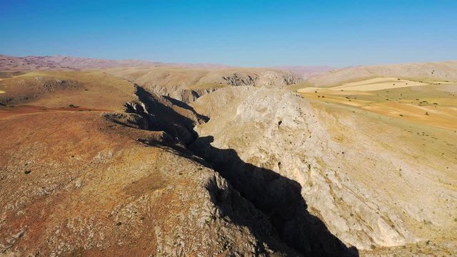 Karanlık Canyon, literally "Dark Canyon", is a deep steep-sided gorge located between the İli&ccedil; and Kemaliye districts of Erzincan Province, Turkey, formed by Karasu River on the Munzur Mountains.