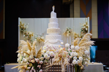 Wedding doll on cake, love couple
