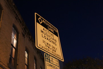 Austin 6th Street Musician Loading Sign