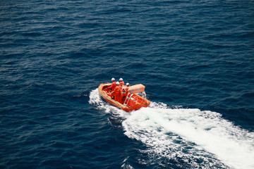 A lifeboat or life raft carried for emergency evacuation in the event of a disaster aboard a ship....