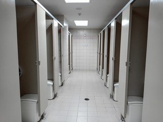 Clean restroom, public toilet in building,restroom,lavatory, doors
