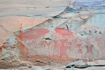 Three thousand year hematite painting on Pha Taem wall in Thailand