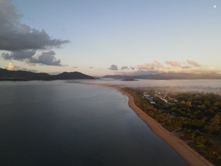 beach sunrise fog