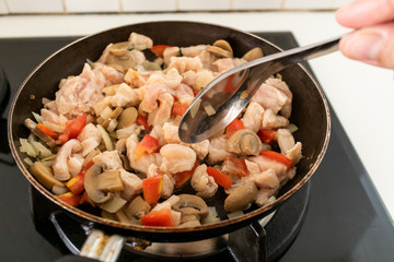 Homemade fried pork with tomato sauce for pasta.