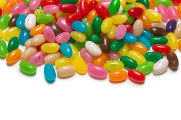 Colorful jelly beans isolated on white.