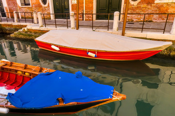 Fototapeta na wymiar Colorful Boats Canal Venice Italy