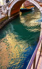 Fototapeta na wymiar Colorful Canal Bridge Venice Italy