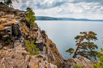 The rocky shore of a picturesque lake