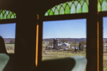 Fototapeta na wymiar farm view from a train