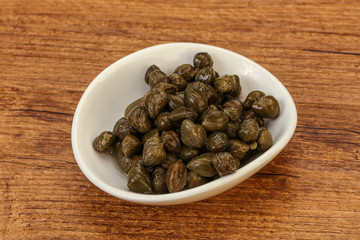Tasty capers in the bowl