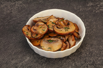Roasted champignon with herbs and spices