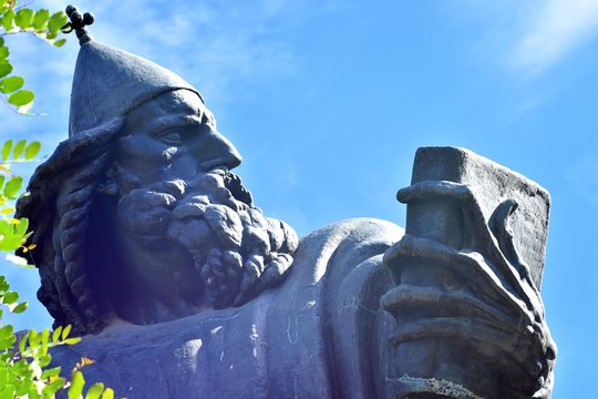 Split, Croatia, memorial stature of bishop Grgur Ninski and bell tower of St. Arnir and benedictine monastery in beautiful classic park
