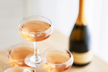 Tower made of glasses with champagne, closeup