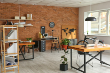 Interior of comfortable modern office, blurred view