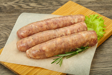 Raw pork meat sausages for grill