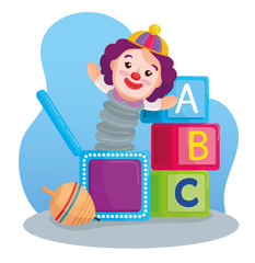 kids toys, alphabet cubes with clown in box and spinning toy vector illustration design