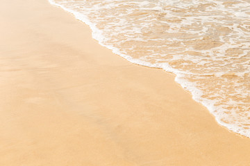 Empty clean sand beach with clear sea water wave, summer outdoor day light, nature concept background