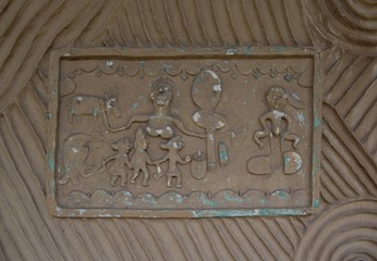 Antique clay designer on wall