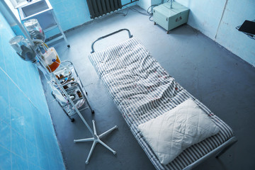 Old hospital ward with bad and medical supplies. View from above