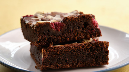 Chocolate cake with raspberry. Brownie with raspberries.