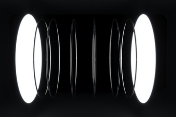 Several white rings of light resonate like sound waves.