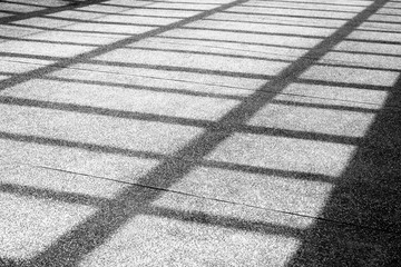 Abstract stripe shadow lines on ground. 