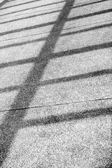 Abstract stripe shadow lines on ground. 