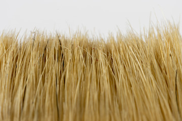 Old rusty paint brush bristle closeup