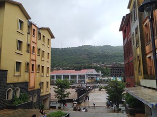 Fototapeta premium Lavasa, Maharashtra/India- August 15 2020: The traditional street and houses of an European town of Portofino.