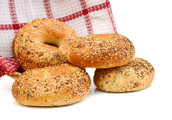 Everything Bagels Isolated in basket with towel on White background
