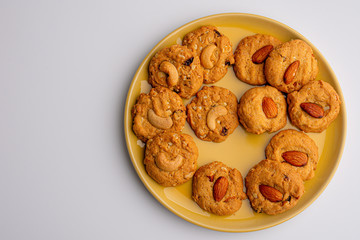 Homemade Almond cookies on white table background.