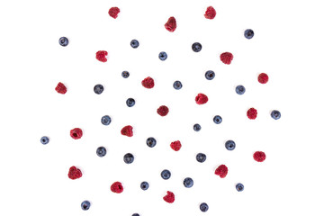 raspberries and blueberries isolated on white background
