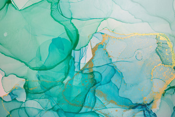 Alcohol ink blue and green abstract background. Ocean style watercolor texture.