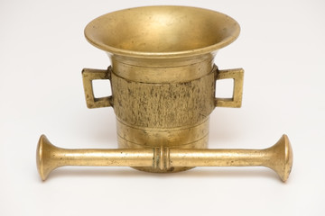 Old mortar with pestle isolated with clipping path