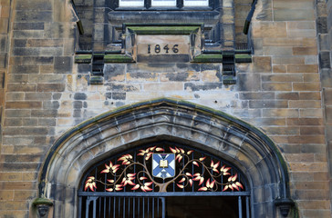 Detail of Carved Stone Entrance to Old Public Building with Date  - obrazy, fototapety, plakaty