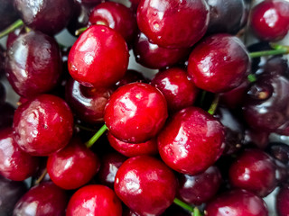  Fresh cherries background. Ripe red berries close-up. Selective focus