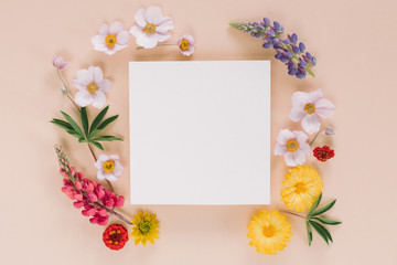 Elegant floral composition with paper blank in the centre. Branding mock up concept.