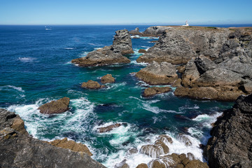 Landscape of Belle-&icirc;le-en-mer, Morbihan, Brittany / Bretagne, France. Rocks and cliffs at the coast on a foggy morning at la pointe des poulains. 