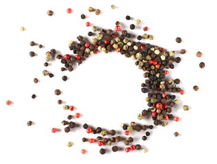 Colorful peppercorn mix, pepper grains round frame and border pile isolated on white background,...