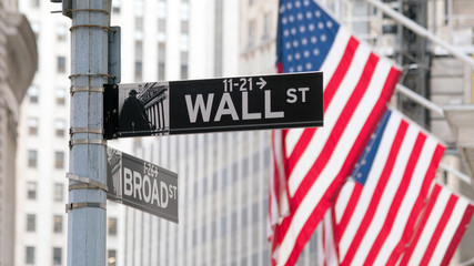 Wall Street sign in lower Manhattan New York - obrazy, fototapety, plakaty