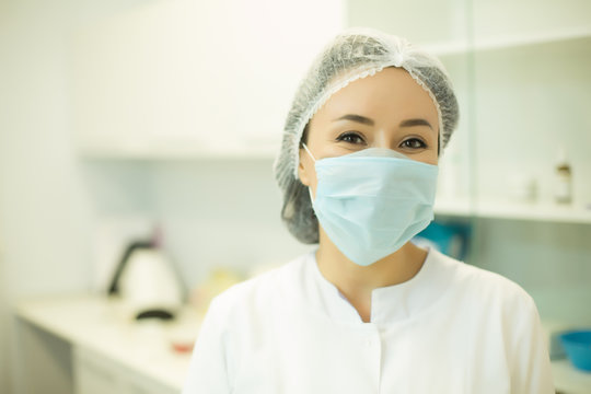 Asian Woman Doctor Nurse Wearing Protection Mask On Face