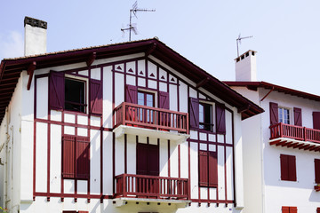 Traditional bask facades with colorful shutter in Basque Country France