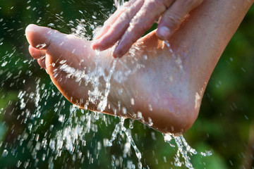 Fototapeta premium Muslim man washes his hands before prayer ritual cleansing.