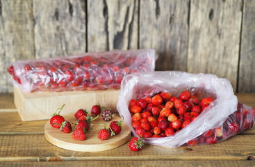 Fruit background. The process of preparing strawberries for storage in the freezer for future use.