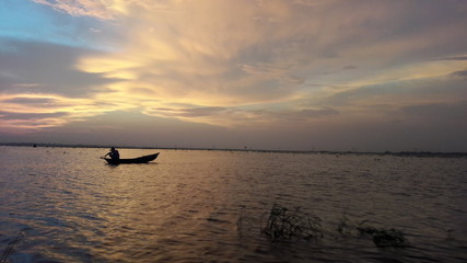 Fototapeta premium Fishing boat at sunset